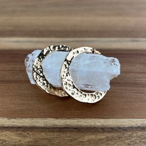 Gold tone hammered hoop earrings